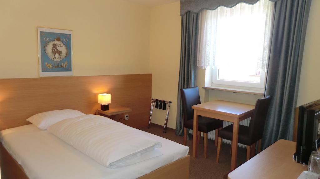 Hotel Simon Gauting Quarto foto